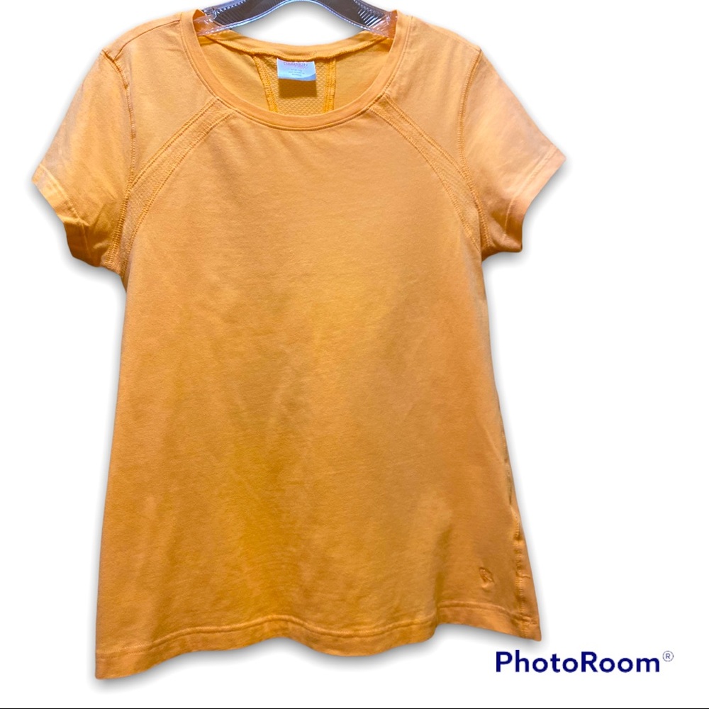 DANSKIN NOW cantaloupe colored short sleeve top, size M